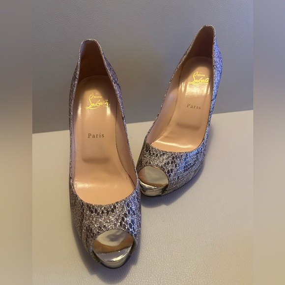 CHRISTIAN LOUBOUTIN
Animal Print Glitter Accents Pumps - Picture 3 of 13